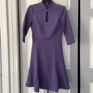 NWT WHBM dress in purple with key hole detail and faux pearl buttons. Flattering
